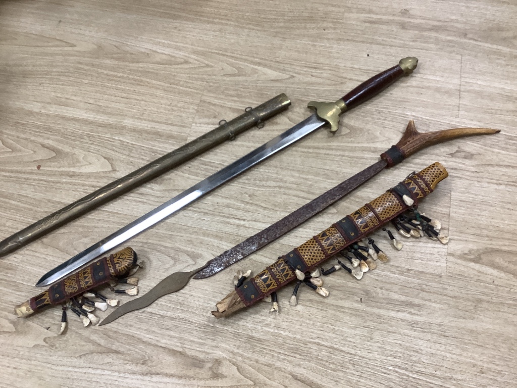 A group of Dayak Borneo tribal weapons and a Chinese sword